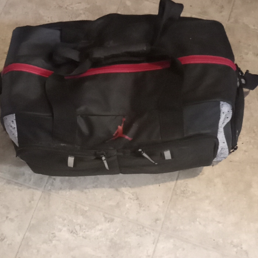 Jordan- red & black duffel bag
